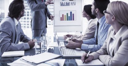 Young business people in board room meeting at the office